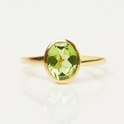 Zoe Sugg Courage Intention Ring In Peridot