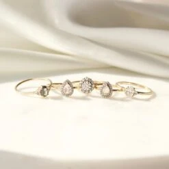 Flora Moissanite & Diamond Cluster Ring -Carrie Elizabeth 97F2C957 68DE 4BCC BB7B 11CCC509CEC2 01b4a9d5 baa7 45ef 8ea1 57cacd90d228 scaled