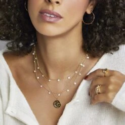 Pearl Droplet Necklace 11 Pearl Droplet Necklace -Carrie Elizabeth Pearldroplets galaxycoin 8b67a8c5 00f6 40e4 bad9 2fb2d8d4328d scaled