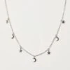 Mini Hanging Charm Necklace In Moon & Stars