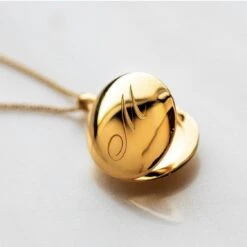 Engraved Initial Locket Necklace With Diamond Detail -Carrie Elizabeth image ddd78920 6bfe 4ac3 a418 2a81744ec84b